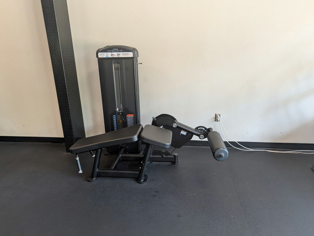 True Fitness lay down hamstring curl
